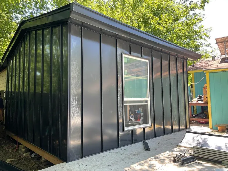 Black standing seam metal wall panels for Metal Roof Installation in Williams