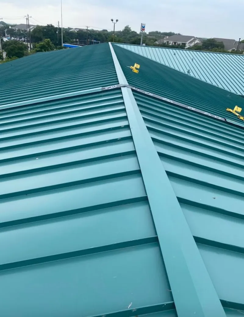 Green commercial metal roof ridge and valley for Metal Roof Repair in Williams